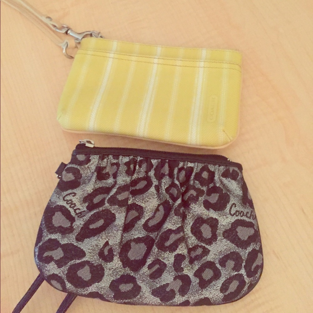 Two Coach wristlets